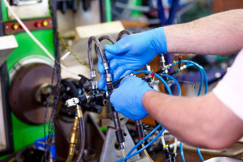 professional-mechanic-testing-diesel-injector-in-h-2026-01-08-00-11-18-utc (1)